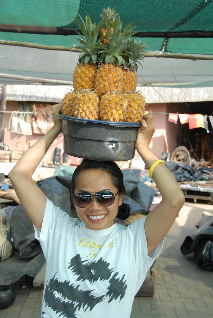 Buying some fruit on the way to our next destination.