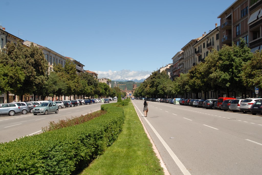 The main street into town, the Alps in the background